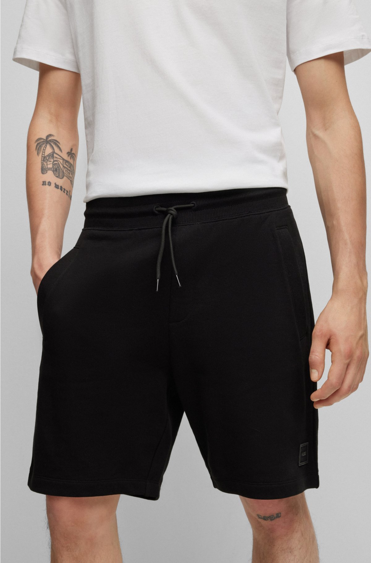 HUGO - Cotton-terry shorts badge with logo tonal