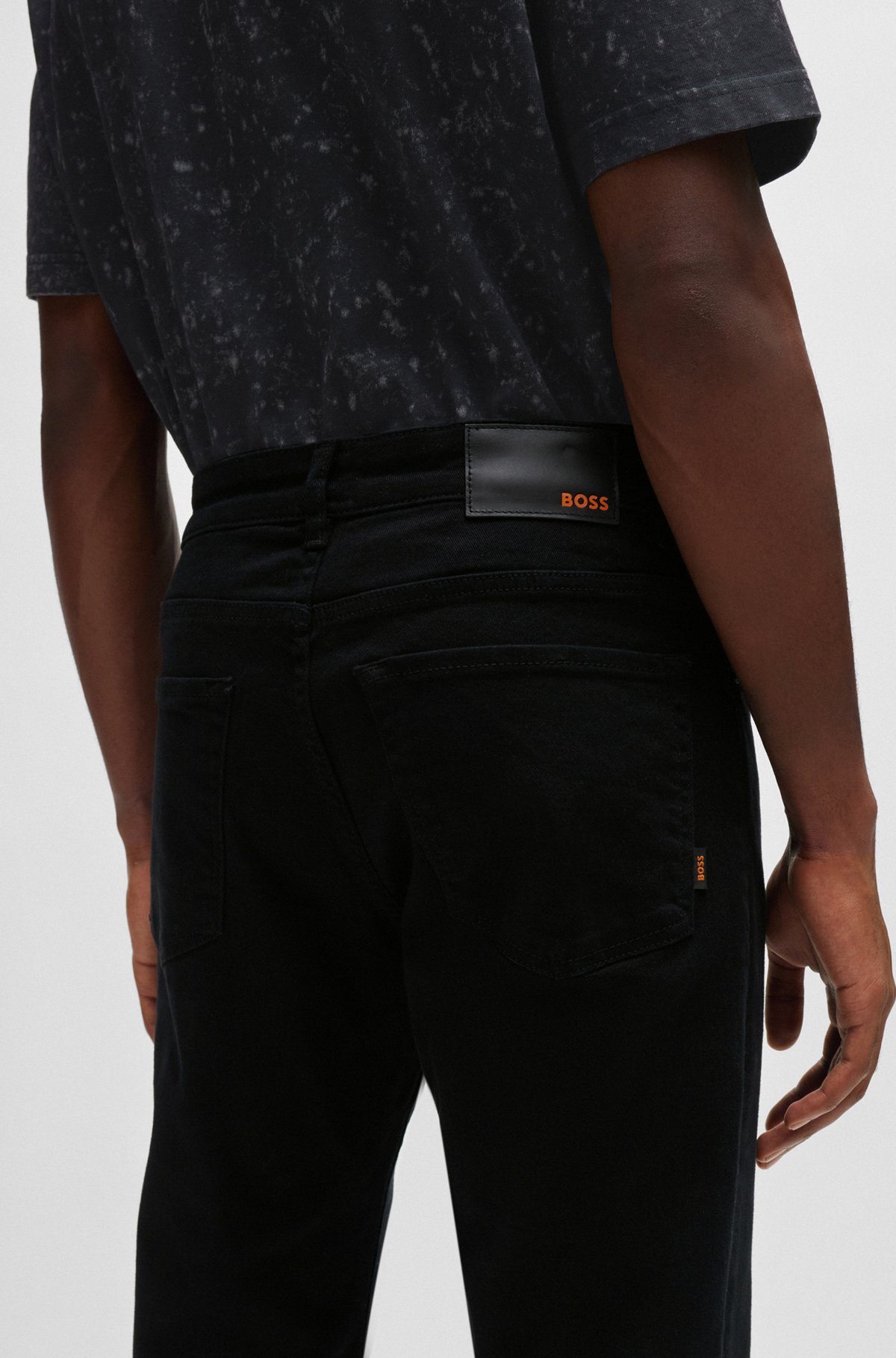 BOSS - Regular-fit jeans in stay-black comfort-stretch denim
