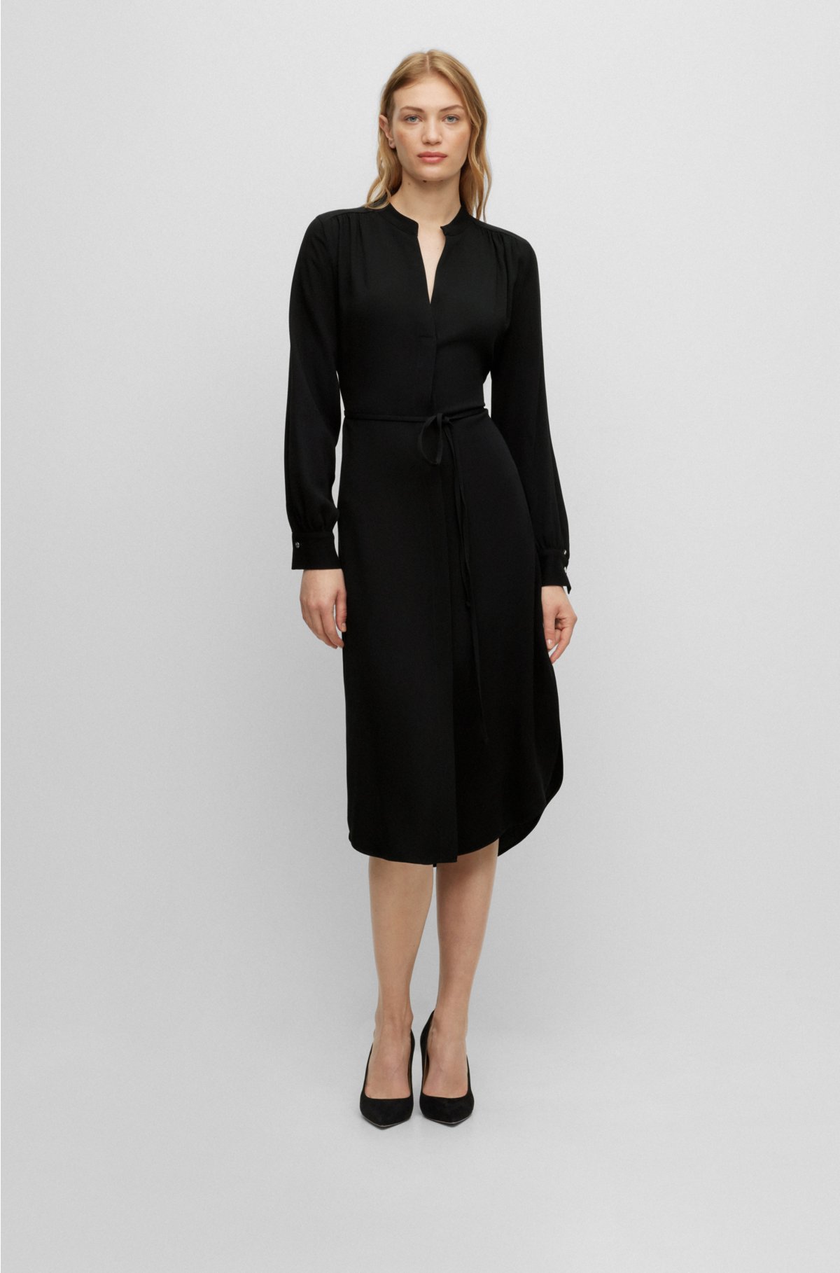 Belted dress with collarless V neckline and button cuffs