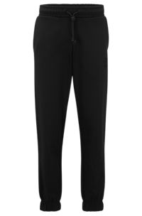 Relaxed-fit cotton-terry tracksuit bottoms with stacked logo, Black