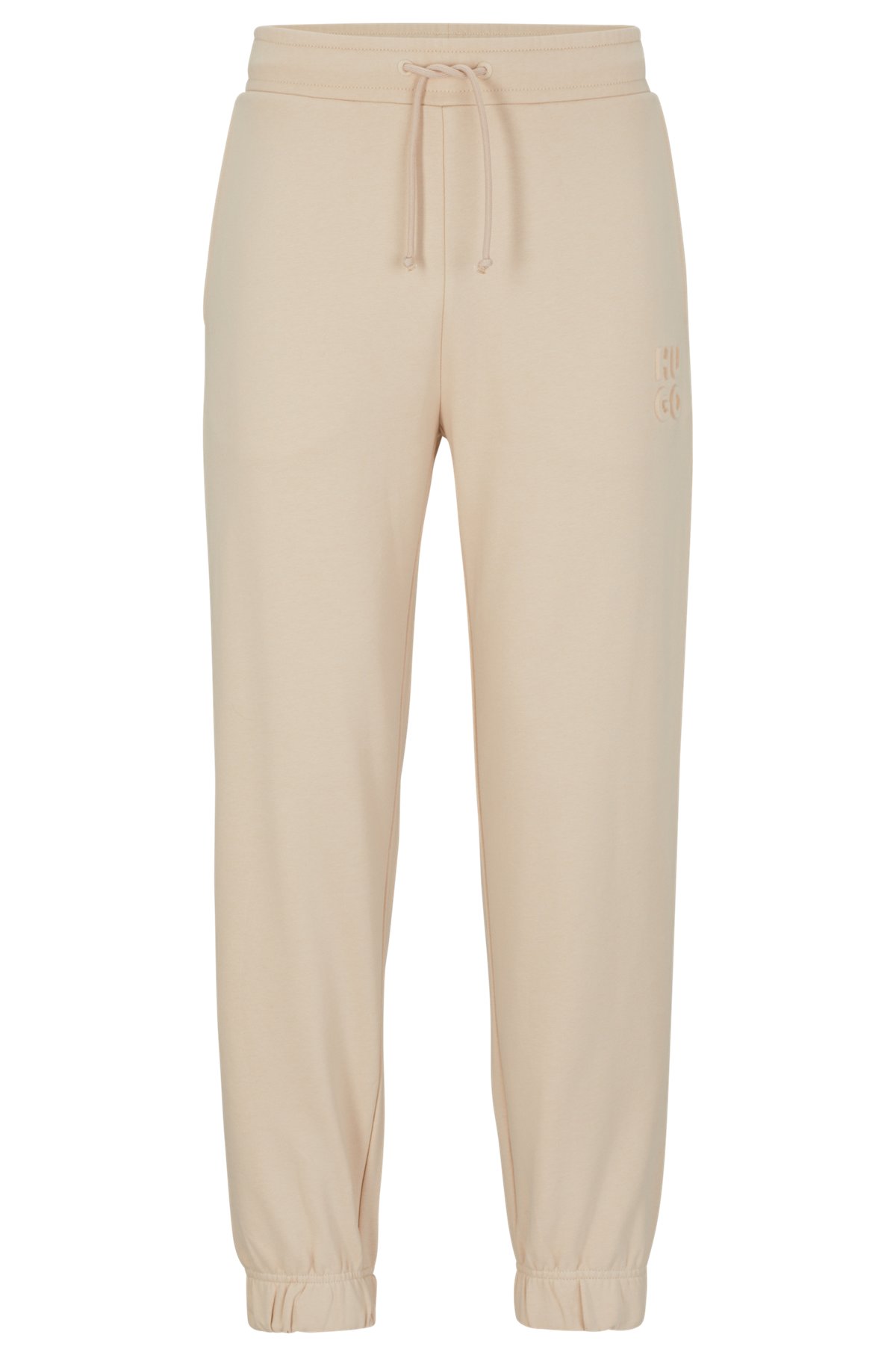 Relaxed-fit cotton-terry tracksuit bottoms with stacked logo, Light Beige