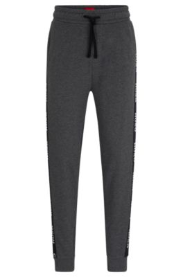 Hugo Cuffed Tracksuit Bottoms In With Logo Tape In Light Grey