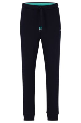 BOSS - Regular-fit tracksuit bottoms with multi-colored logos