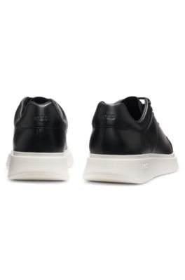 Rubber-outsole trainers in leather, Black