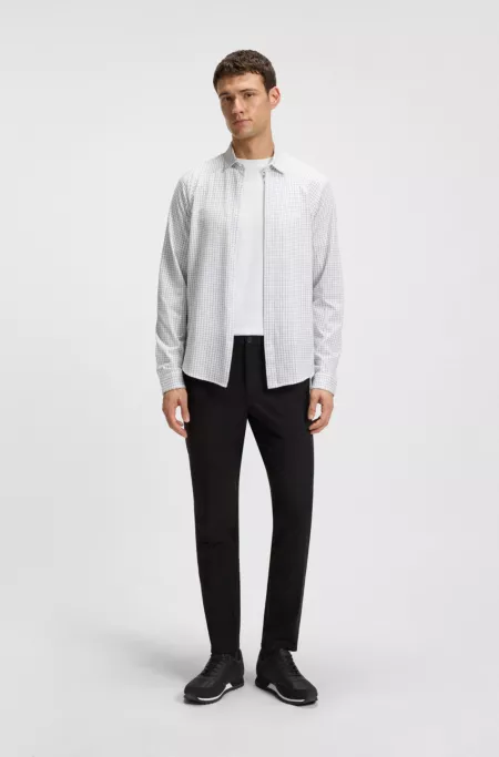 Running-inspired trainers with faux-leather trims