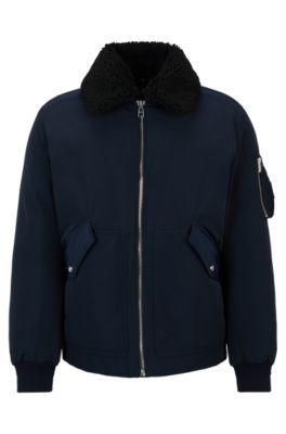 Shop Hugo Boss Water-repellent Jacket With Faux-fur Collar In Dark Blue