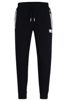 BOSS - Stretch-cotton tracksuit bottoms with embroidered logo