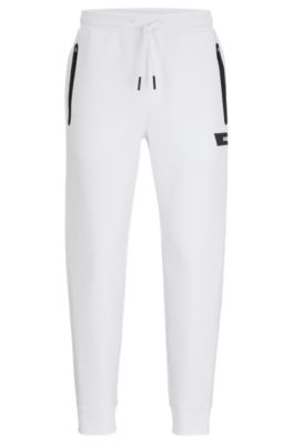 BOSS - Regular-fit tracksuit bottoms with multi-colored logos