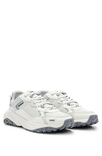 Low-top trainers with open-mesh uppers, White