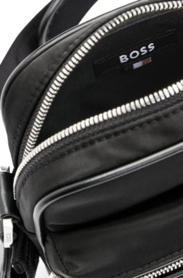 Reporter bag with metallic logo plate, Black