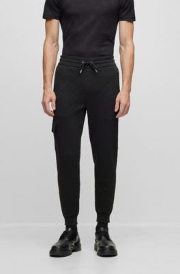 BOSS - Cotton tracksuit bottoms with monogram jacquard