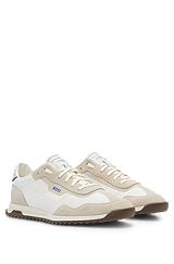 Low-top trainers in mixed materials with washed effect, White