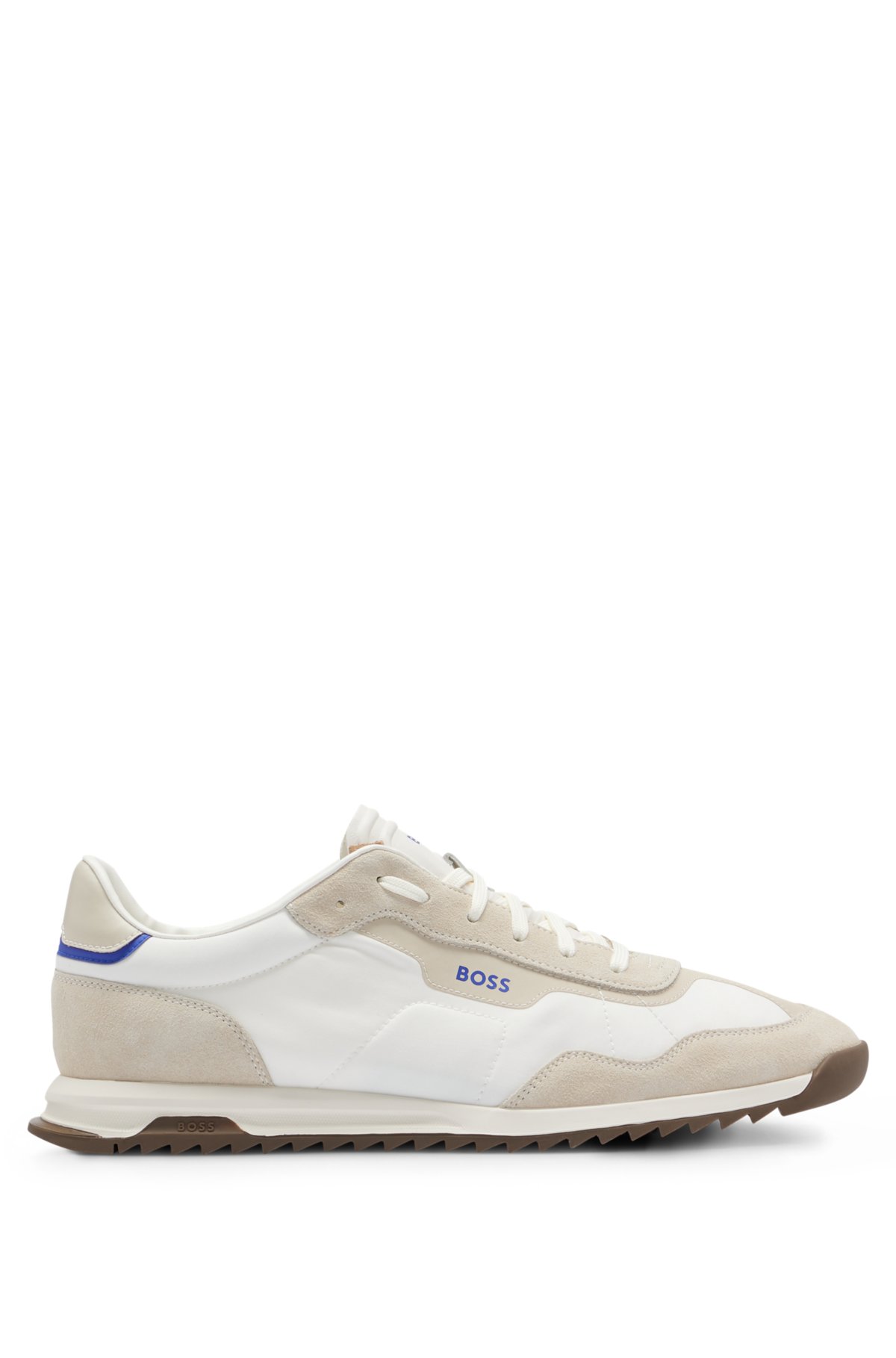 Low-top trainers in mixed materials with washed effect, White