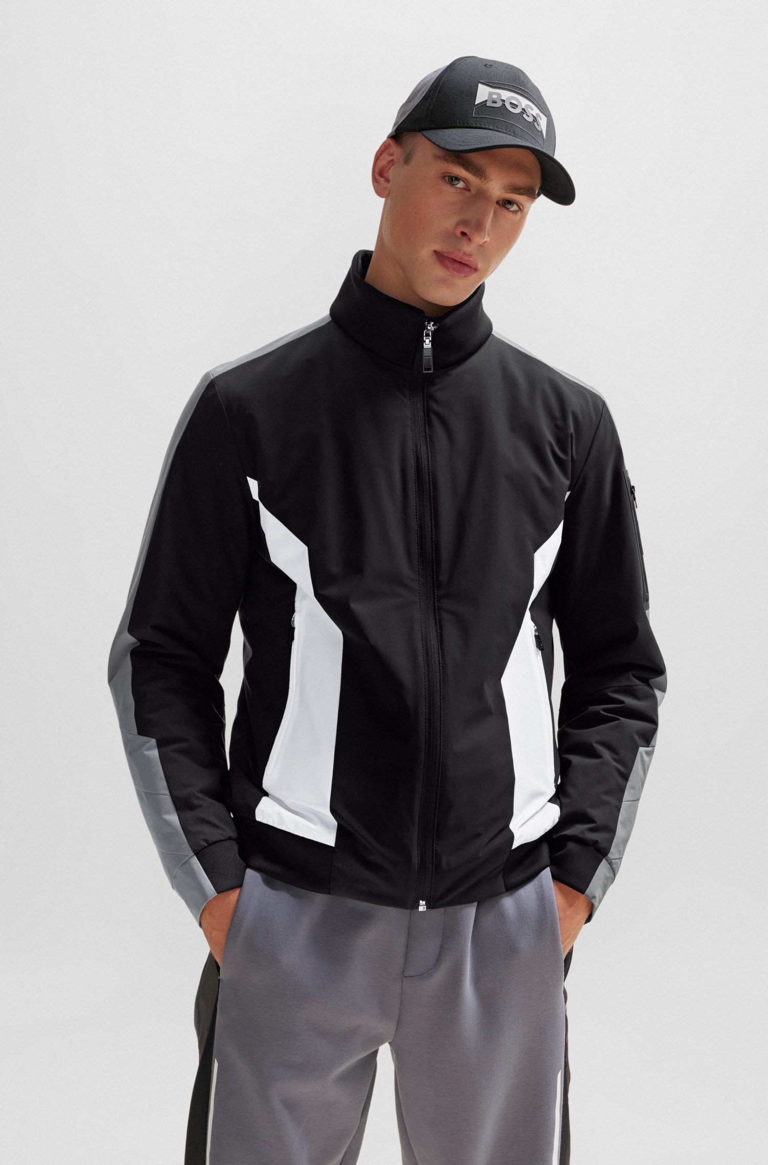 Water-repellent padded jacket with branded sleeve pocket