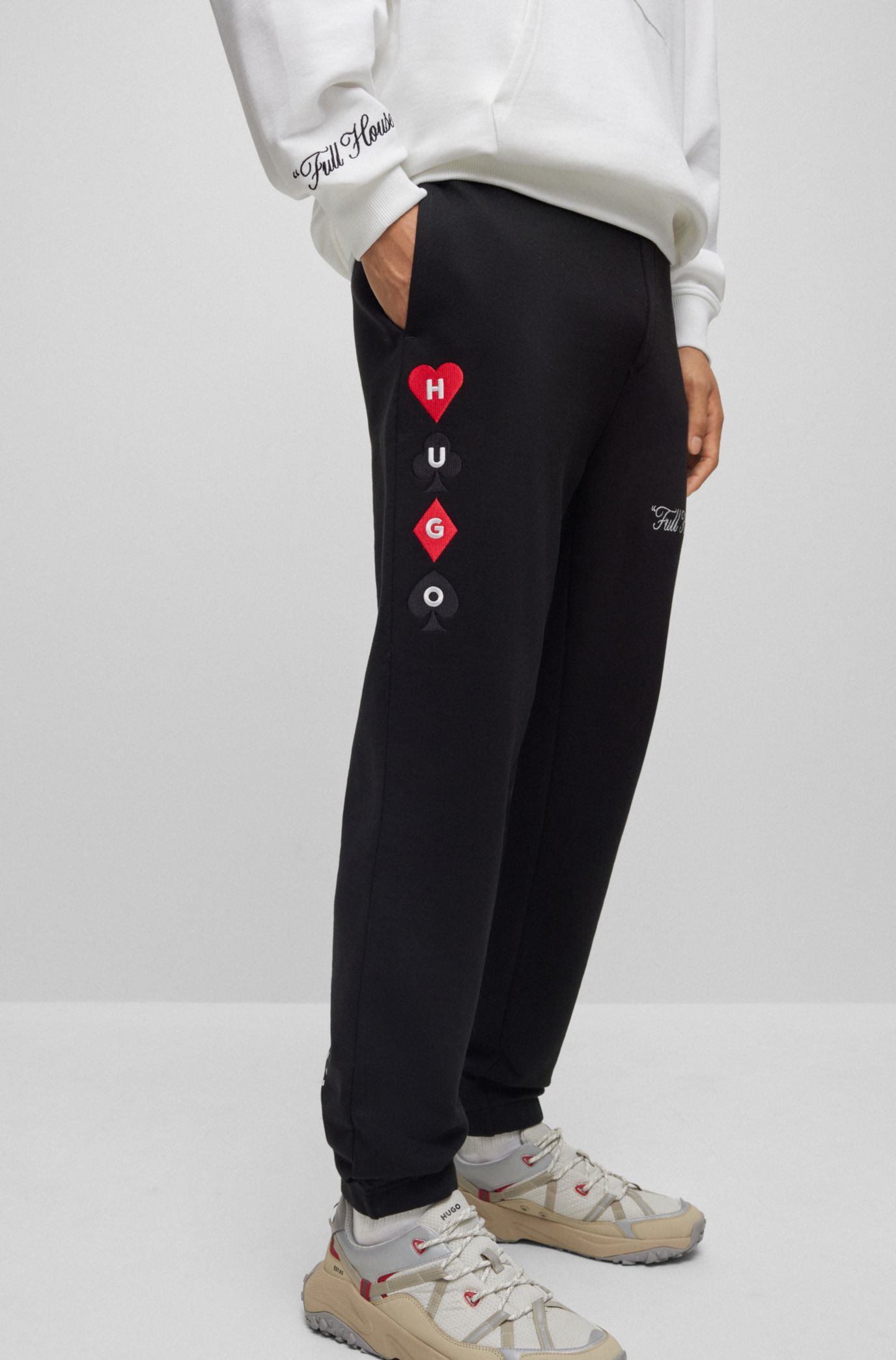 HUGO - Cotton-terry tracksuit bottoms with playing-card artwork