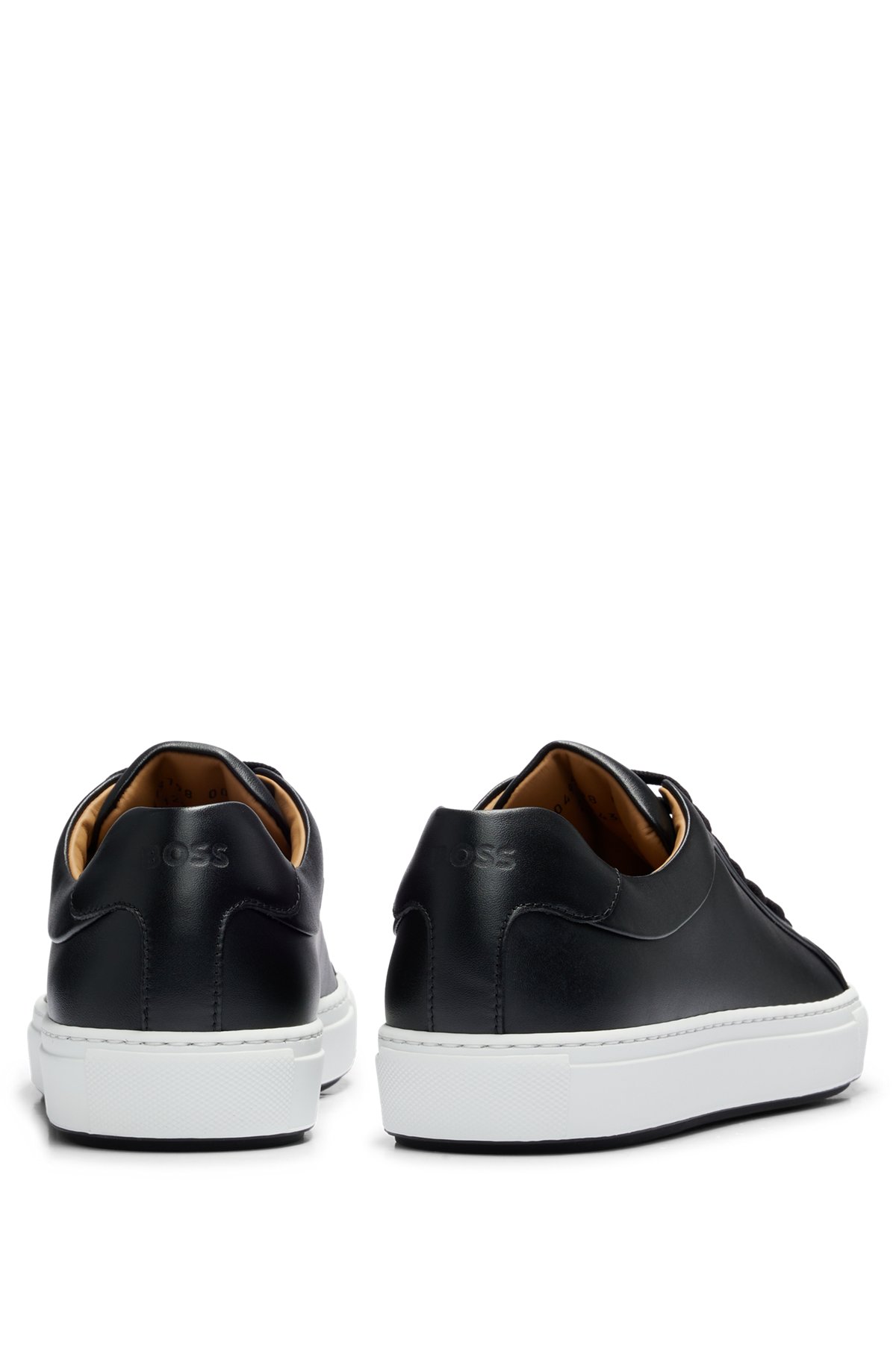 Lace-up trainers in leather with tonal branding, Black