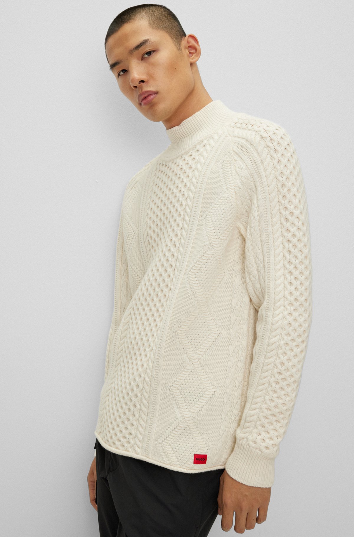 Oversize-fit cable-knit sweater in a wool blend