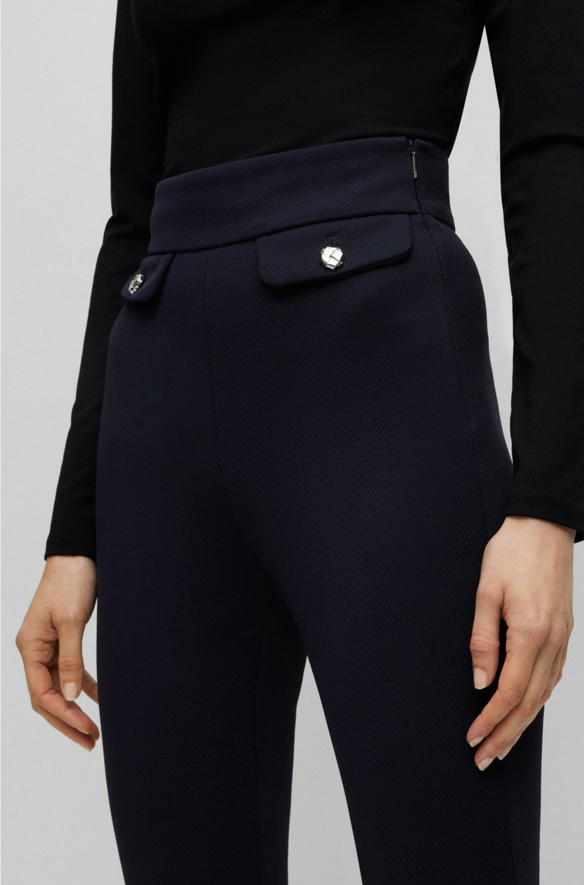 BOSS - Slim-fit high-waisted trousers with flared leg
