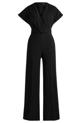 Shop Hugo Boss Slim-fit Jumpsuit With Wrap Front In Black