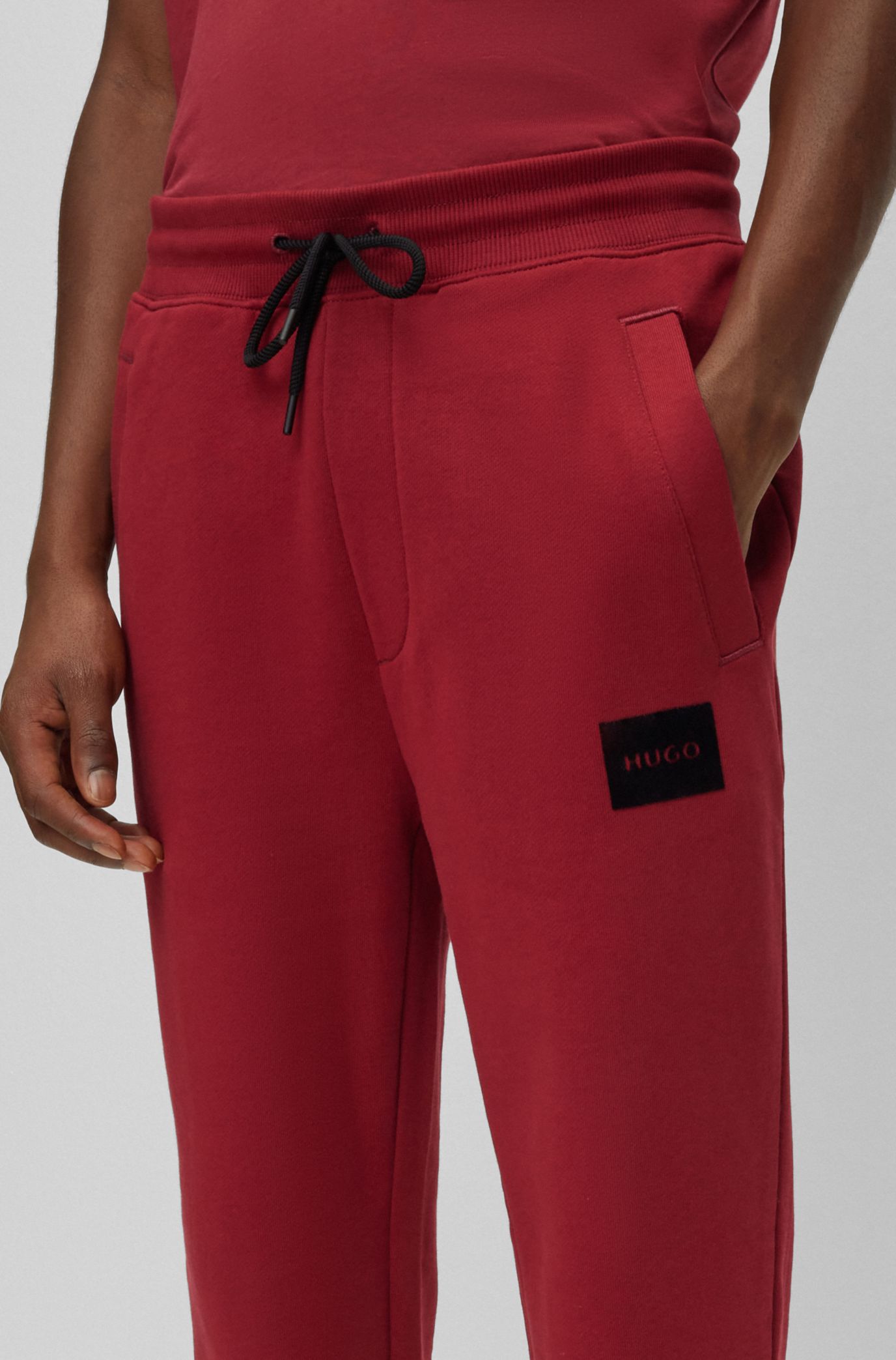 Cotton-terry tracksuit bottoms with metallic-effect logo