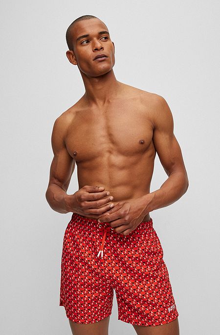 Recycled-material swim shorts with seasonal print, Orange
