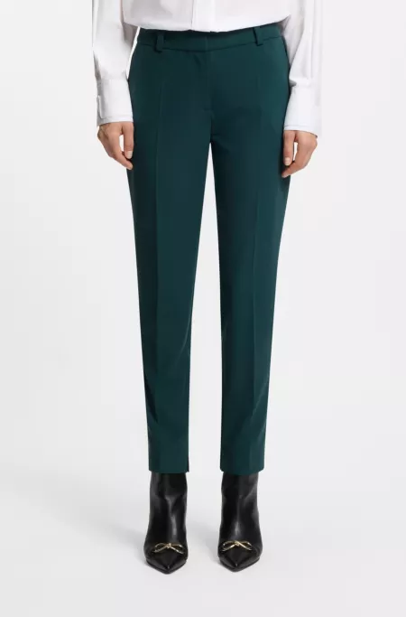 Slim-fit trousers with slit hems