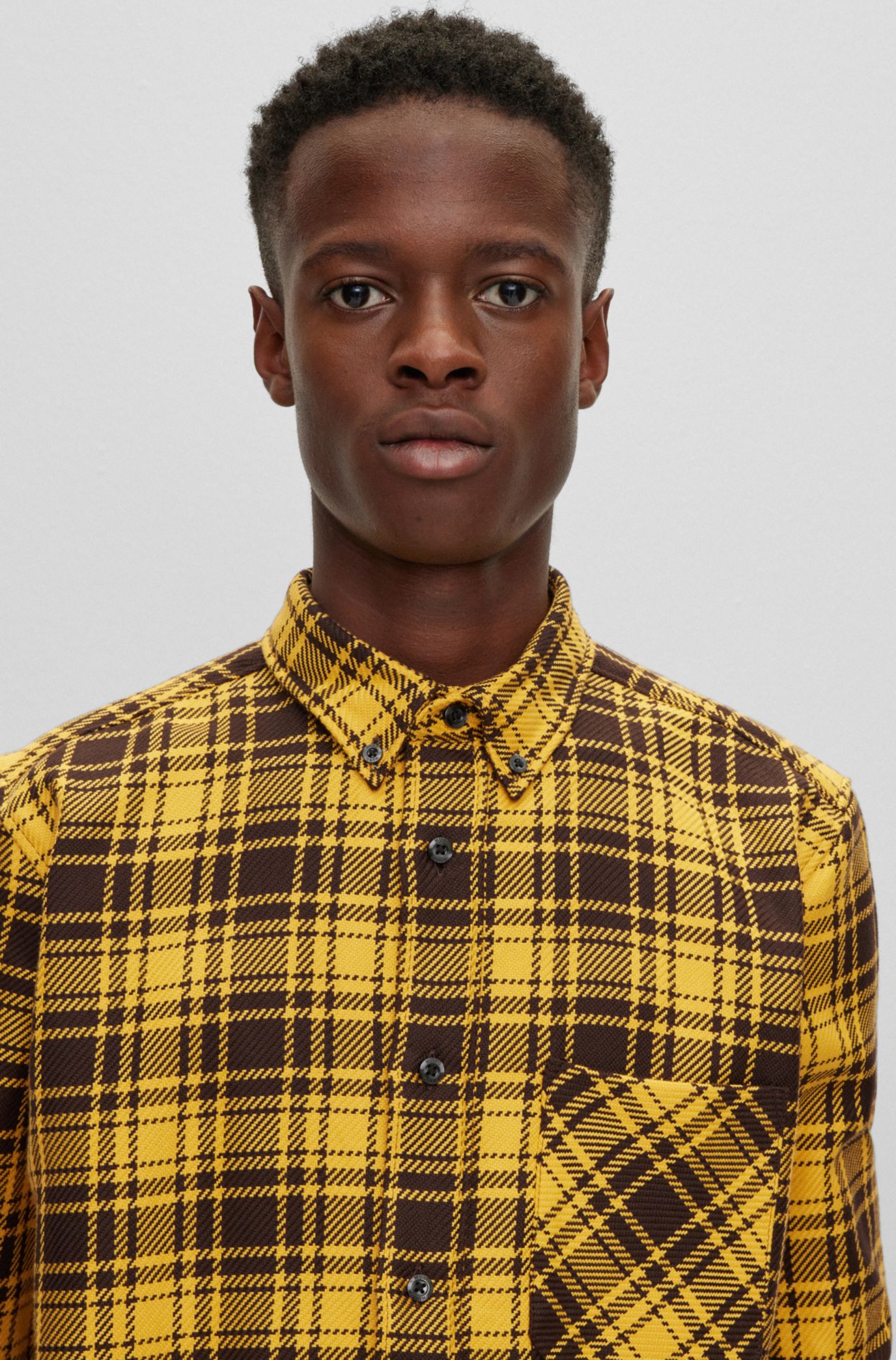 Yellow and store black plaid shirt