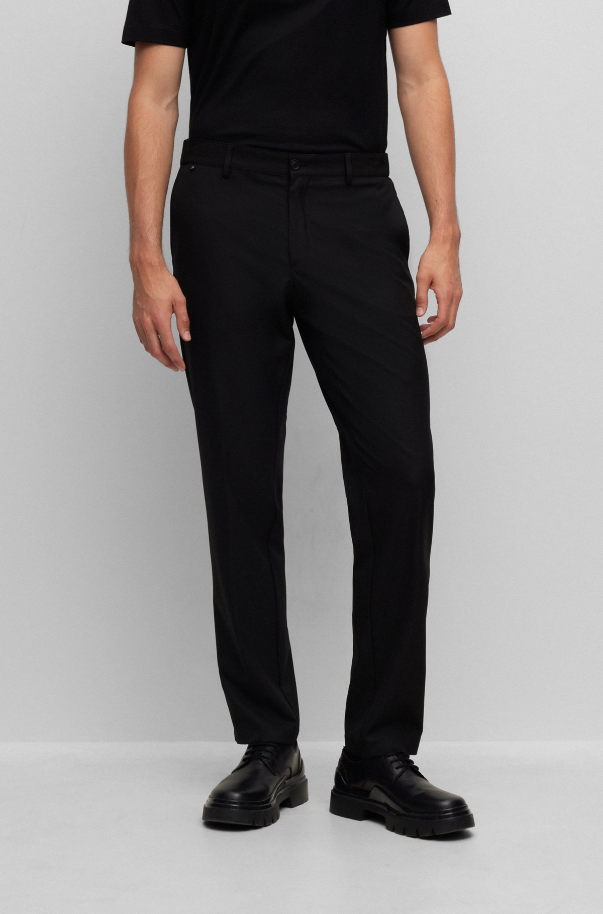 Pantalon Slim Fit en tissu stretch performant à micro motif, Noir
