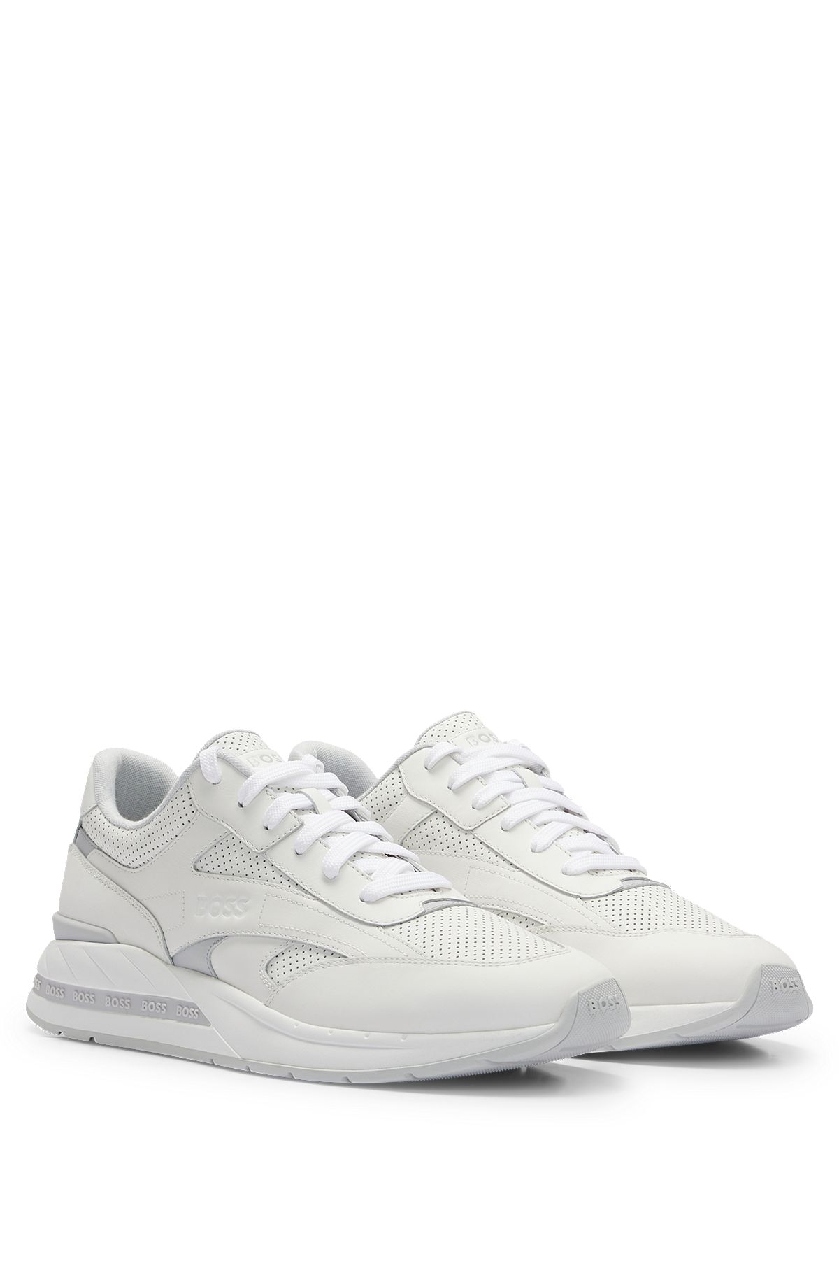 Low-top trainers with perforated and plain leather, White
