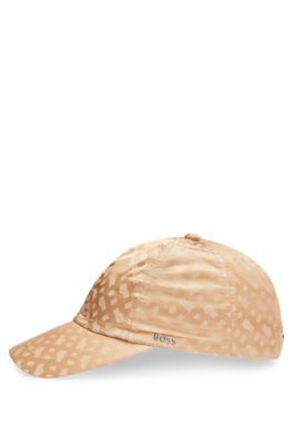 Gorra repelente al agua con monograma de jacquard, Beige