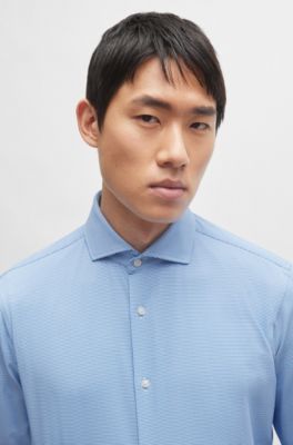 Chemise Regular Fit structur&eacute;e en mati&egrave;re stretch performante, bleu clair