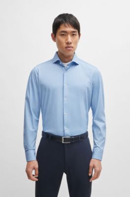 Chemise Regular Fit structur&eacute;e en mati&egrave;re stretch performante, bleu clair