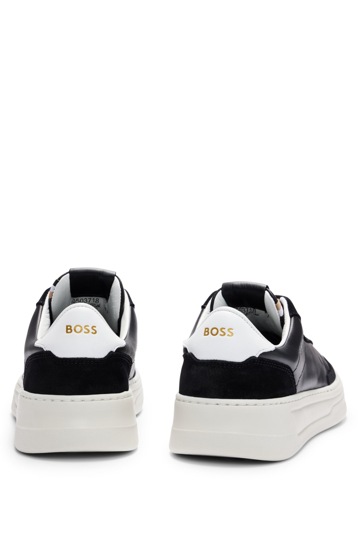 Low-top trainers in leather and suede, Black