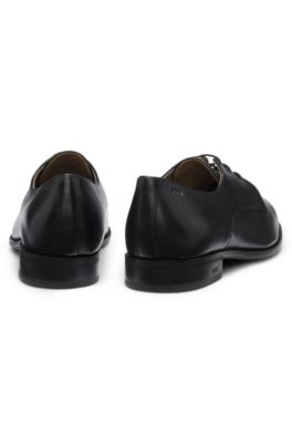 Embossed-logo Derby shoes in leather, Black