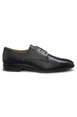 Embossed-logo Derby shoes in leather, Black
