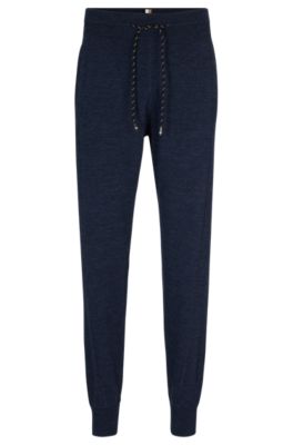 Shop Hugo Boss Regular-fit Tracksuit Bottoms In Virgin Wool In Dark Blue