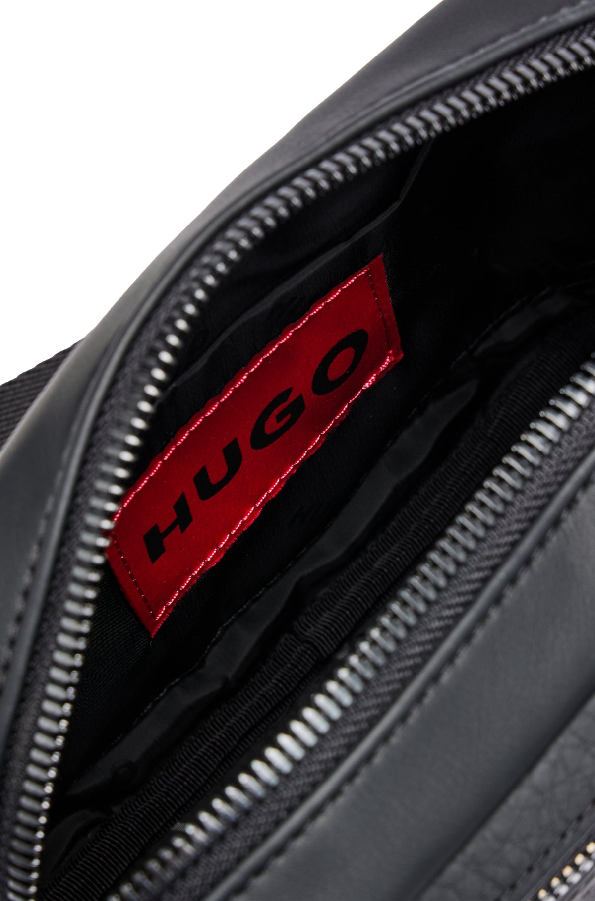 HUGO - Logo-lettering crossbody bag in synthetic coated fabric