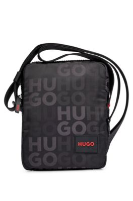 Hugo Stacked-logo-pattern Reporter Bag With Branded Rubber Patch In Black
