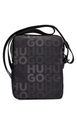 Stacked-logo-pattern reporter bag with branded rubber patch, Black