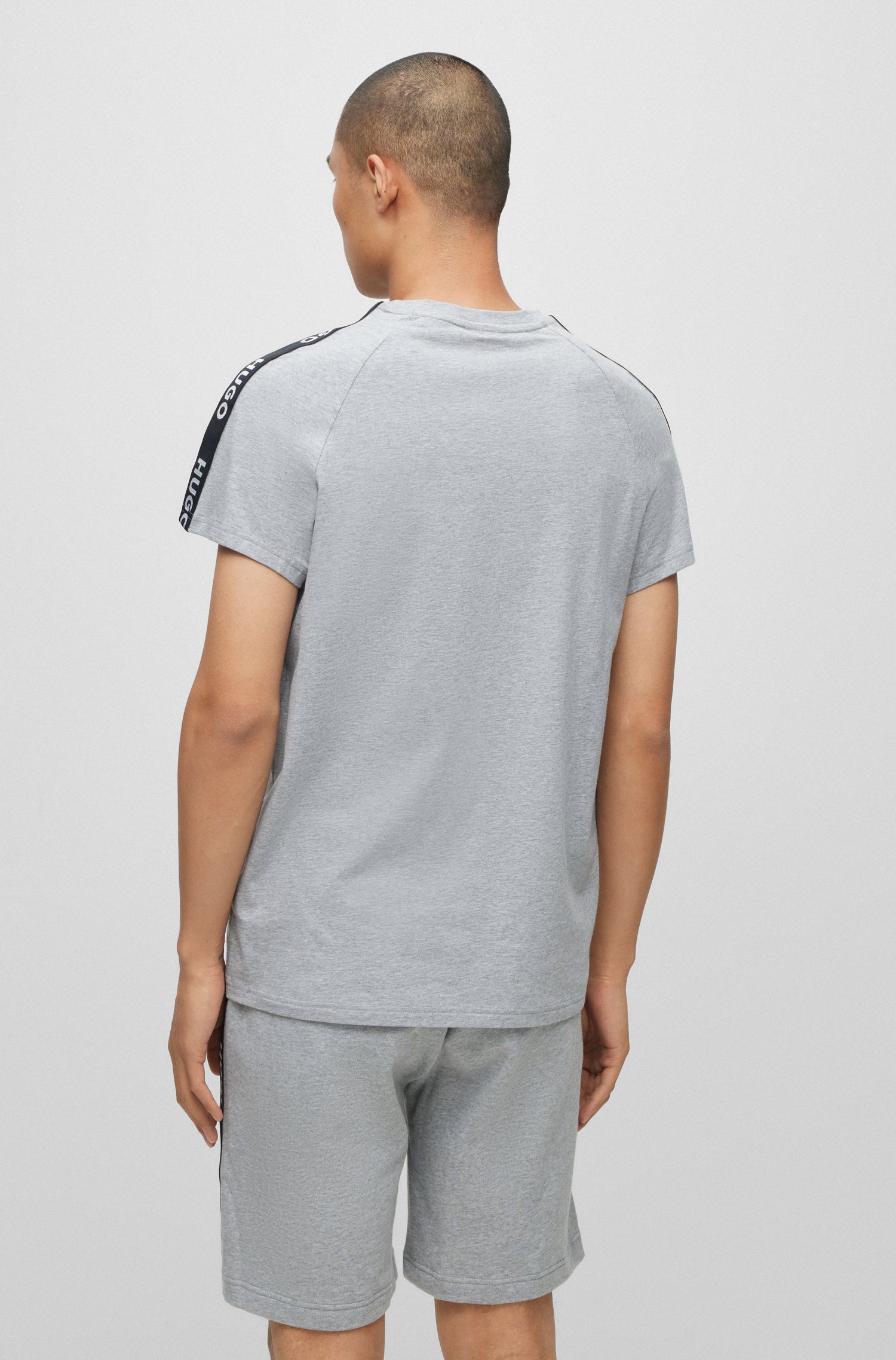 Camiseta relaxed fit de algodón elástico con cinta logos