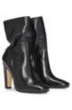 High-heeled boots in nappa leather with monogram trim, Black