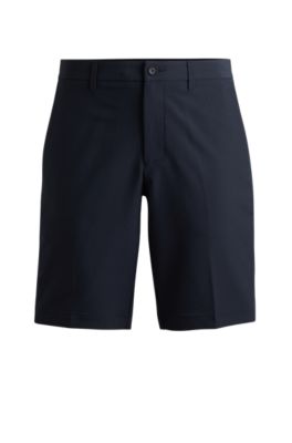Shop Hugo Boss Slim-fit Shorts In Easy-iron Four-way Stretch Fabric In Dark Blue