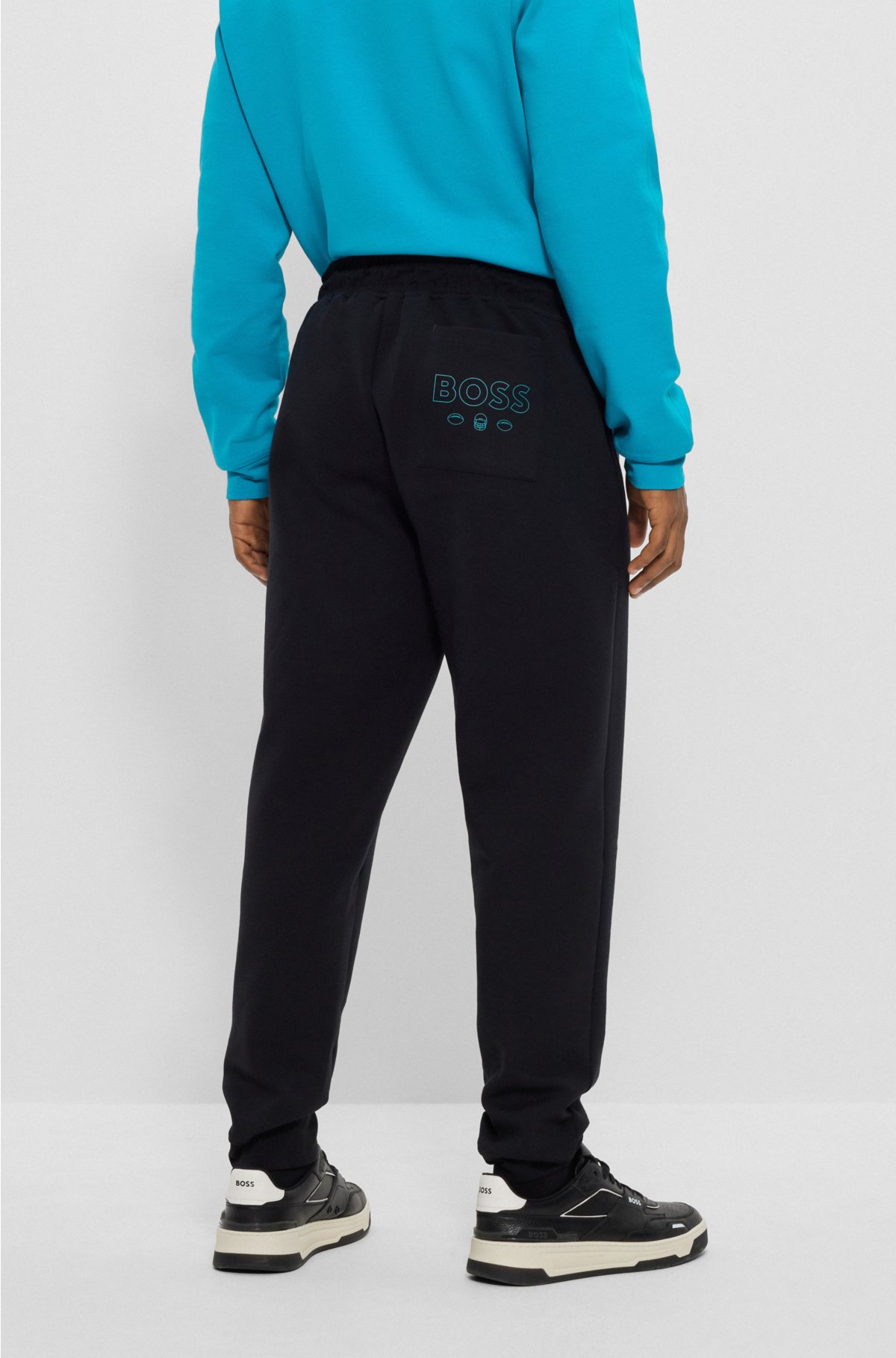 BOSS x NFL cotton-blend tracksuit bottoms with collaborative branding, Dolphins