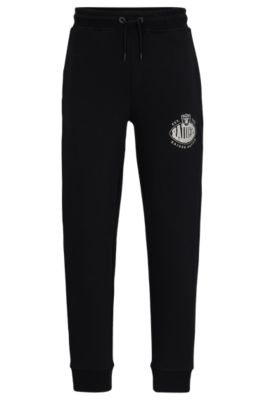 Shop Hugo Boss Boss X Nfl Cotton-blend Tracksuit Bottoms With Collaborative Branding In Raiders