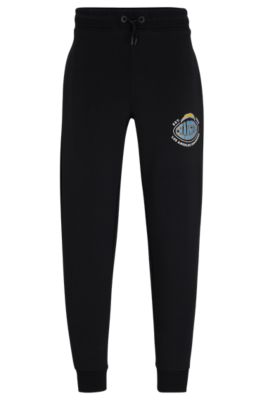 Shop Hugo Boss Boss X Nfl Cotton-blend Tracksuit Bottoms With Collaborative Branding In Chargers