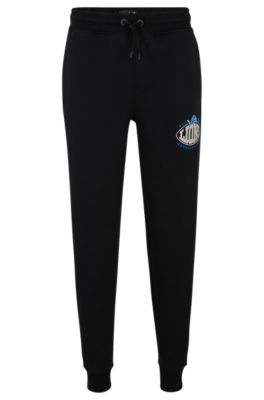 Shop Hugo Boss Boss X Nfl Cotton-blend Tracksuit Bottoms With Collaborative Branding In Lions