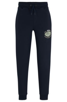 Shop Hugo Boss Boss X Nfl Cotton-blend Tracksuit Bottoms With Collaborative Branding In Seahawks