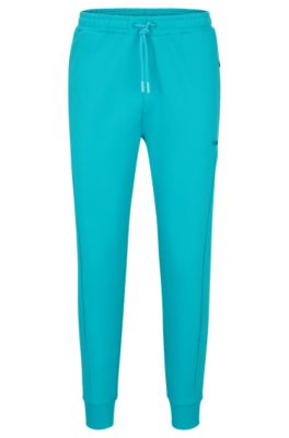 Shop Hugo Boss Cotton-blend Tracksuit Bottoms With Hd Logo Print In Light Green