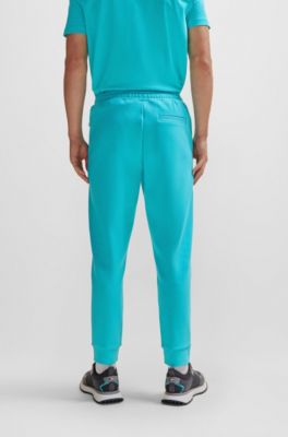 Pantalones de ch&aacute;ndal de algod&oacute;n con logo estampado en HD, Cal