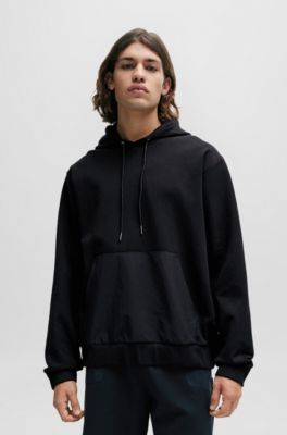 Sudadera con capucha relaxed fit en algod&oacute;n el&aacute;stico con bolsillos en contraste, Negro